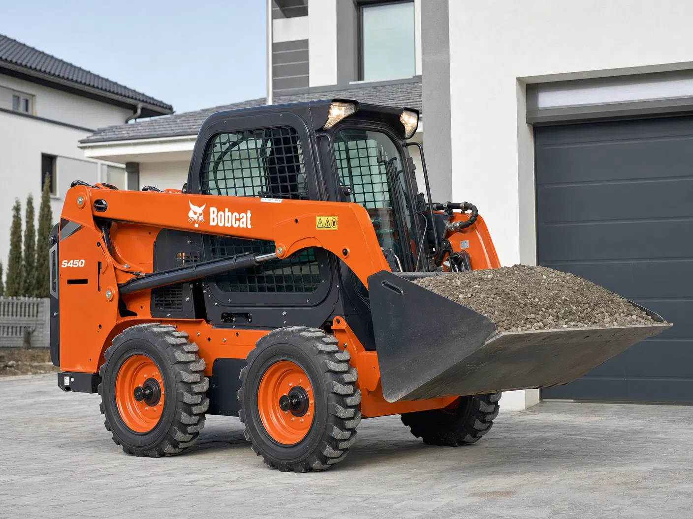 Mini carregadeira Bobcat S450 para obra residencial